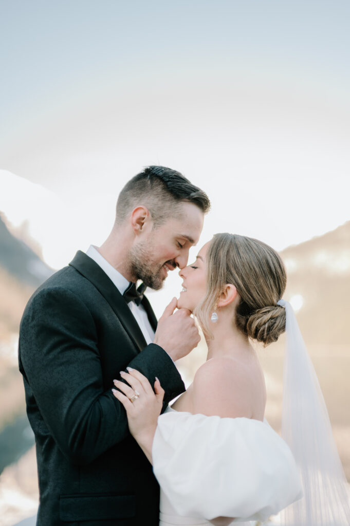 bride-and-groom-almost-kissing-close-up-styled-lake-louise-wedding-portrait-banff-wedding-photography